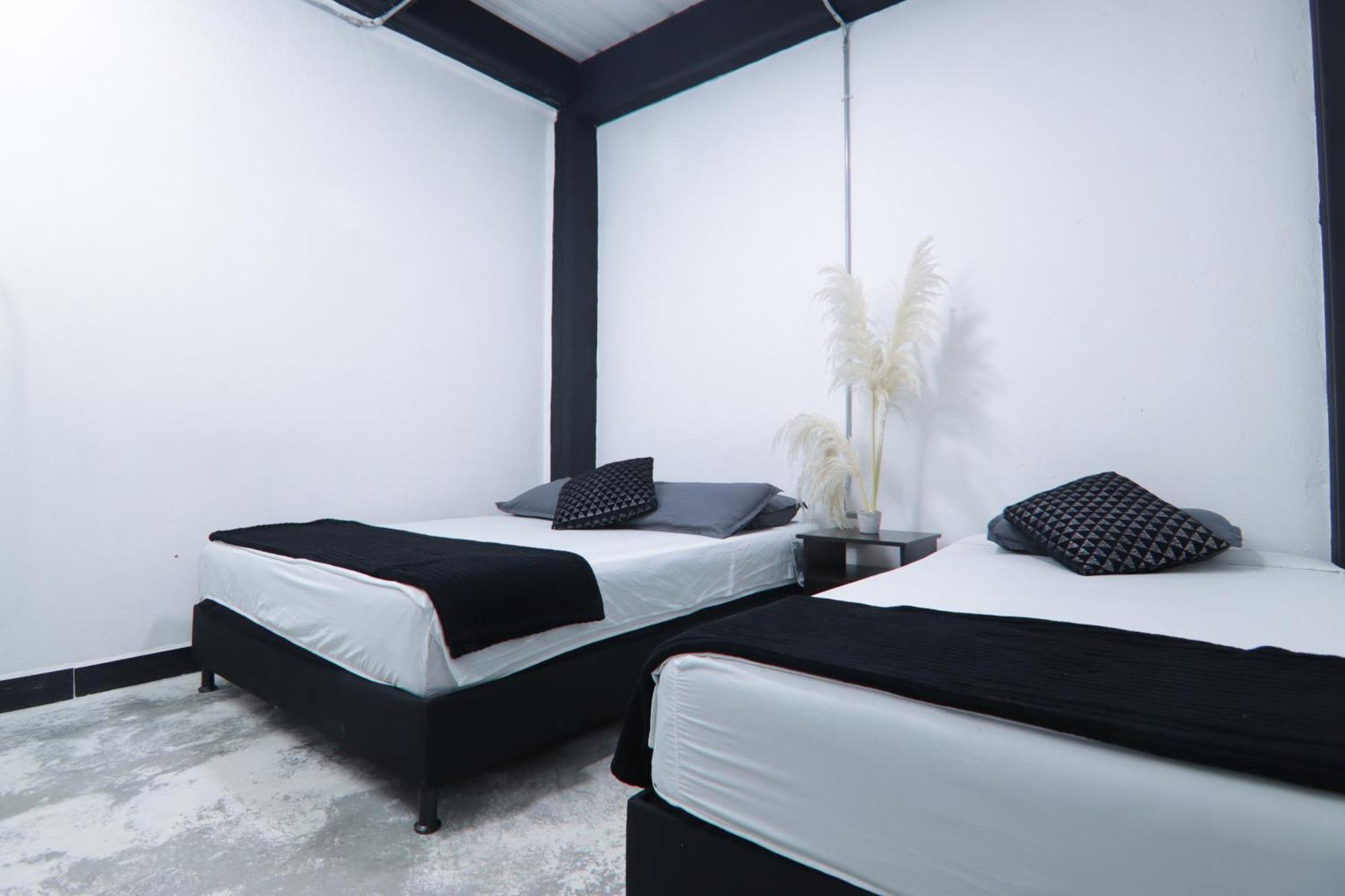 Hotel Casa Laureles Malibu Medellín