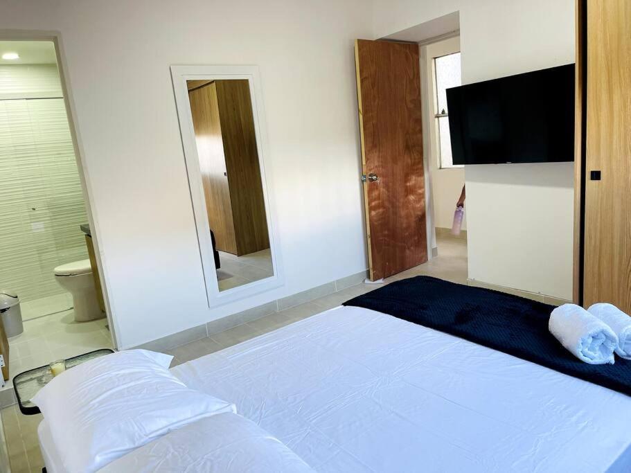 Apartamento Acogedor,luz Natural , Agua Caliente ,200 Mbps,central. *