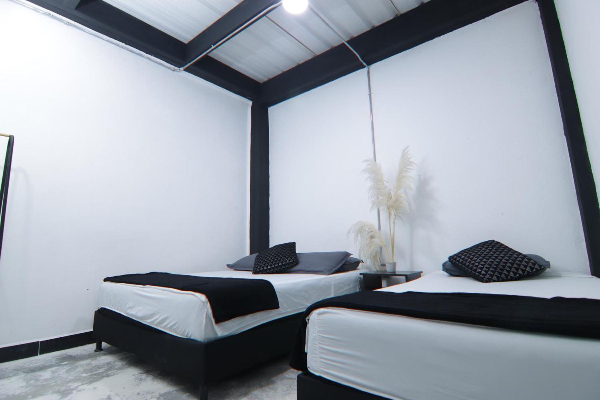 Hotel Casa Laureles Malibu Medellín